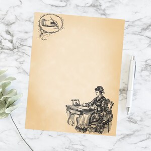 May include: A vintage-style stationery sheet with a cream background and black ink illustrations. The top of the sheet features a hand holding a pen in a circle. The bottom of the sheet features a woman sitting at a desk writing in a book.