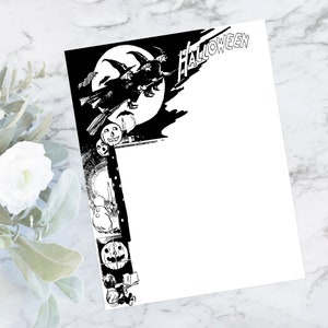 May include: A white Halloween-themed stationery sheet with a black and white border. The border features a witch on a broomstick in front of a full moon, jack-o'-lanterns, and the word "Halloween".