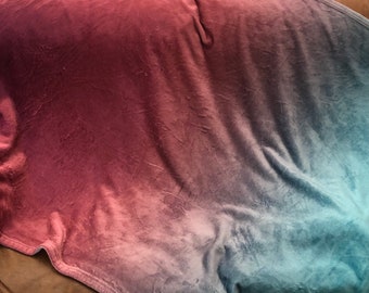 Manta ombré color turquesa y burdeos