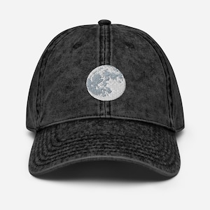 Embroidered white and gray full moon on black denim hat. Size is adjustable