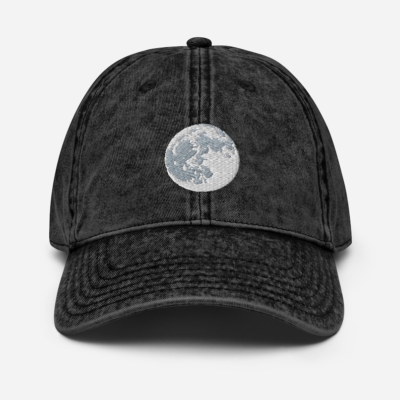 Embroidered white and gray full moon on black denim hat. Size is adjustable