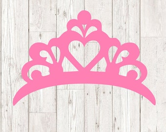 May include: A pink plastic tiara with a heart-shaped design. The tiara is a popular accessory for children's dress-up and pretend play.