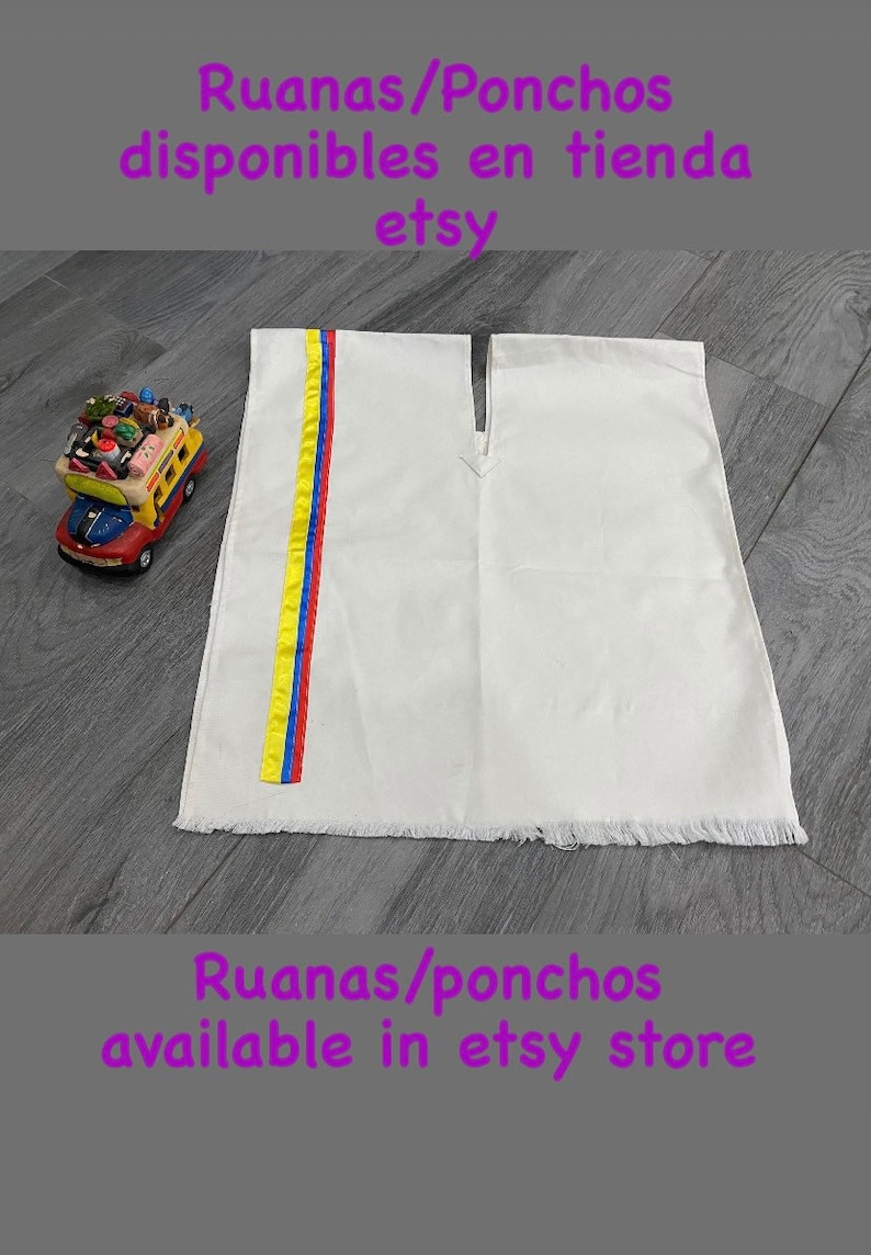 May include: White poncho with a yellow, blue, and red stripe down the side. The poncho has a fringe border. The text "Ruanas/Ponchos disponibles en tienda etsy" is at the top of the image. The text "Ruanas/ponchos available in etsy store" is at the bottom of the image.