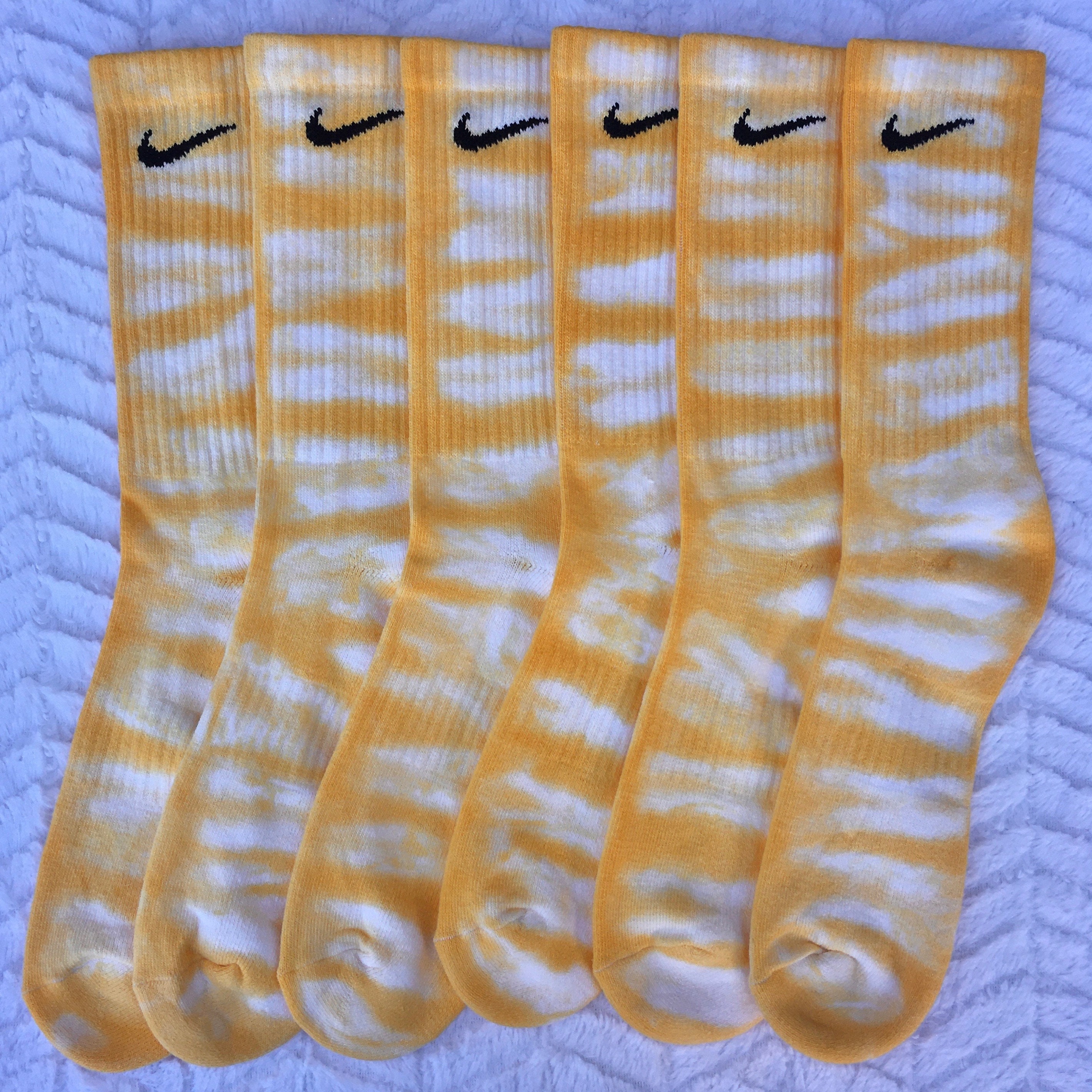 red and yellow nike socks