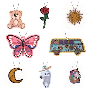 May include: Set of nine car air fresheners with various designs, including a teddy bear, a rose, a sun, a butterfly, a van, a crescent moon, a sloth, and a unicorn.