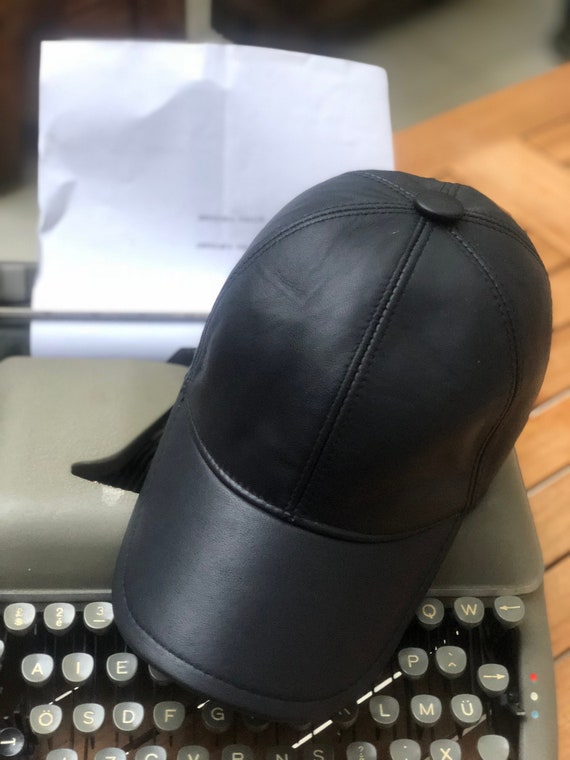 blue leather baseball cap