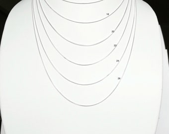 May include: A silver chain necklace displayed on a white mannequin. The necklace is shown in various lengths, from 16 inches to 26 inches.