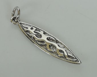 May include: Silver charm in the shape of a surfboard with a flame design.