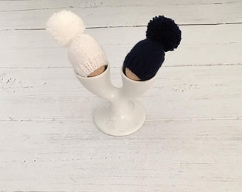 Set of two hand knitted egg cosies, navy and white, first home gift, new home gift