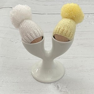 Lemon and white hand knitted egg cosy set