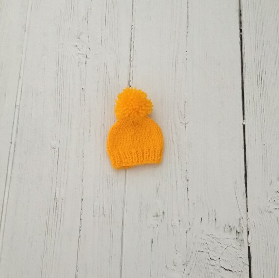 Sunshine yellow knitted egg cozy