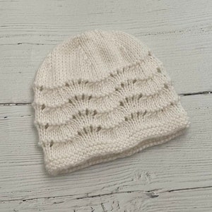 White knitted baby hat- feather and fan detail-0-3 months