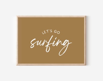 May include: A framed print with a mustard yellow background and white text that reads "Let's go surfing".
