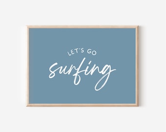 May include: A blue framed print with white text that reads "Let's Go Surfing" in a handwritten font.