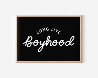 May include: Black and white print with the text "Long Live Boyhood" in a white cursive font on a black background.