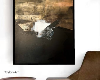 May include: Abstract painting with black, brown, and gold paint. The painting has a white square in the center and is framed in black.
