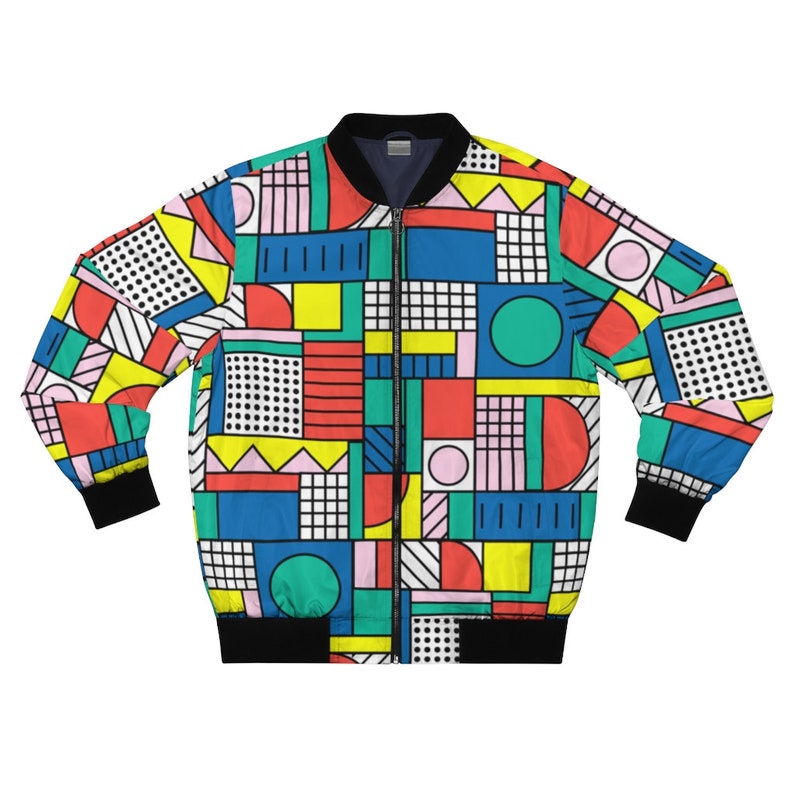 May include: A colorful bomber jacket with a geometric pattern in shades of red, yellow, blue, green, pink, and black.