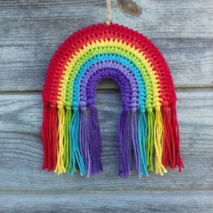 Crochet rainbow hanging decor on the wall or window