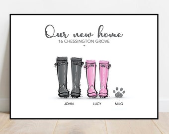 May include: A white print with the text "Our new home 16 CHESSINGTON GROVE" and a drawing of three pairs of rain boots. The boots are grey for John and Lucy, and pink for Milo. A paw print is below Milo's boots.