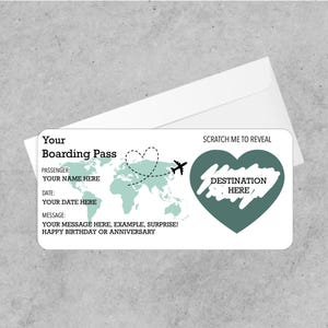 May include: A white boarding pass with teal accents and a matching envelope. The pass features a world map, a dotted heart-shaped flight path, and the text "Your Boarding Pass." It includes fields for passenger name, date, and a message. The destination is hidden under a scratch-off area.