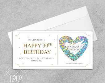 May include: A white card with gold trim and a holographic heart that says "Week Away To Greece" inside. The card says "To Charlotte Happy 30th Birthday Love You With All My Heart - Simon XX" and "Scratch to reveal surprise".