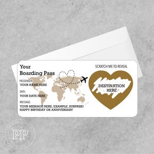 May include: A boarding pass design with a world map, airplane, and heart-shaped dotted line. The pass includes fields for passenger name, date, and a message. A scratch-off area reveals "DESTINATION HERE". Includes a white envelope.