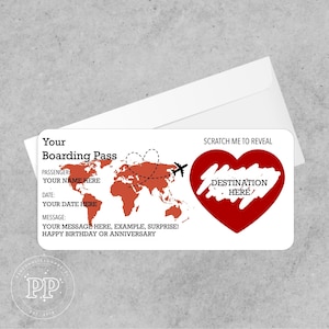 May include: A white boarding pass with a red world map design, airplane, and heart. Text includes "Your Boarding Pass", "Scratch Me to Reveal", and prompts for passenger name, date, and message. Includes a white envelope.