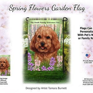 May include: A rectangular garden flag featuring a brown curly-haired dog illustration centered among birch trees and purple flowers. The text at the top reads The Smith Family Welcomes You. The flag is displayed on a black metal stand.