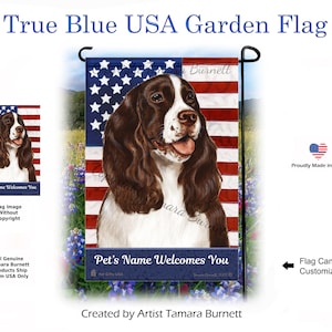 May include: A brown and white English Springer Spaniel dog with a red, white, and blue American flag background. The flag has the text "Pet's Name Welcomes You" at the bottom. The text "Created by Artist Tamara Burnett" is at the bottom of the image.
