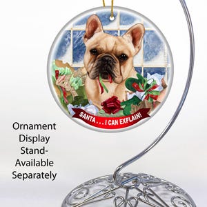 a glass ornament with a picture of a dog on it