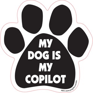 May include: Black paw print car magnet with white text that reads "My Dog Is My Copilot".