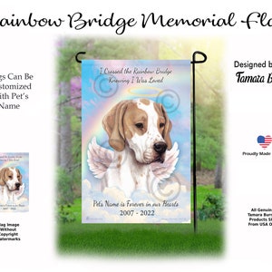 May include: A memorial garden flag with a white and brown dog with angel wings. The flag has a rainbow and clouds with the text "I Crossed the Rainbow Bridge Knowing I Was Loved". The flag also has the text "Pet's Name is Forever in our Hearts 2007-2022".