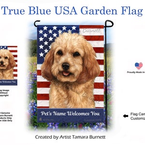 May include: A garden flag featuring a golden doodle dog with a red, white and blue American flag background. The text "Pet's Name Welcomes You" is printed on the flag.
