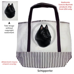 Puede incluir: Bolso tote blanco con un retrato de un perro Schipperke dentro de un círculo gris. Tiene asas moradas oscuras y un borde inferior a rayas. La palabra "Schipperke" está en la parte inferior.