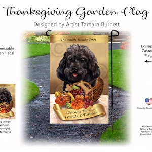 May include: Thanksgiving garden flag featuring a black dog with a basket of harvest goods. The flag includes the text "The Smith Family 2021" and "Welcome Family, Friends, & Furballs." The flag is designed by artist Tamara Burnett.