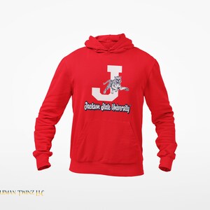 May include: Red hooded sweatshirt with a white letter "J" and a white tiger jumping out of the letter. The text "Jackson State University" is below the letter.