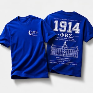 May include: A royal blue short-sleeve t-shirt featuring a white crescent moon and Greek letters on the front. The back displays the year 1914, the text Phi Beta Sigma Fraternity, Inc., Culture for Service and Service for Humanity, and a building graphic.