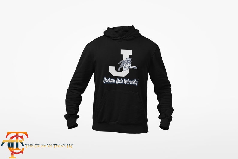May include: Black hooded sweatshirt with a white letter J and a white tiger inside the letter. The text "Jackson State University" is below the letter.