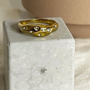 Golden ring with cubic Zirconia stones • Waterproof and tarnish free • Helios Ring