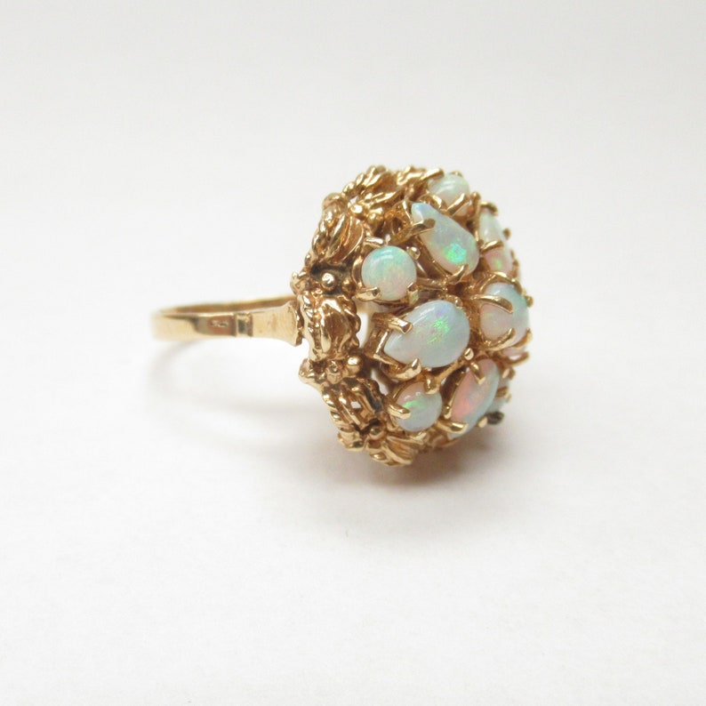 14k 585 yellow gold flower motif opal ring 8.0 grams size 6.5