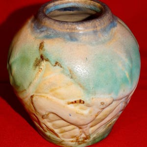 BOURNE DENBY: ‘Danesby Ware’ &#39;&#39;FAUN” shaped vase in &#39;Pastel Blue&#39; c. 1933