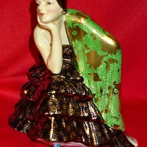 R H and S L Plant Ltd: TUSCAN CHINA seated ‘Spanish Girl’ figure, c.1936