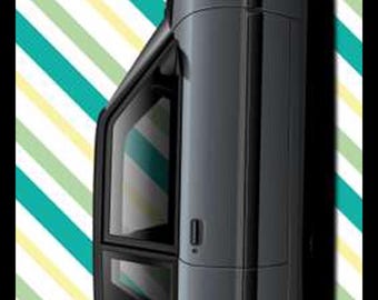 May include: A skateboard deck featuring a gray car illustration. The car has black wheels and is set against a background of diagonal stripes in teal, yellow, and white. The text "TOOL and DYE" is in the top corner.