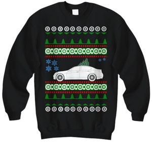 May include: Black Christmas sweater with a white car and green Christmas trees. The sweater has a red and white snowflake pattern.