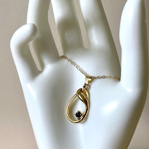Necklace Vintage Gold Tone and Black Gem Swirl Pendant