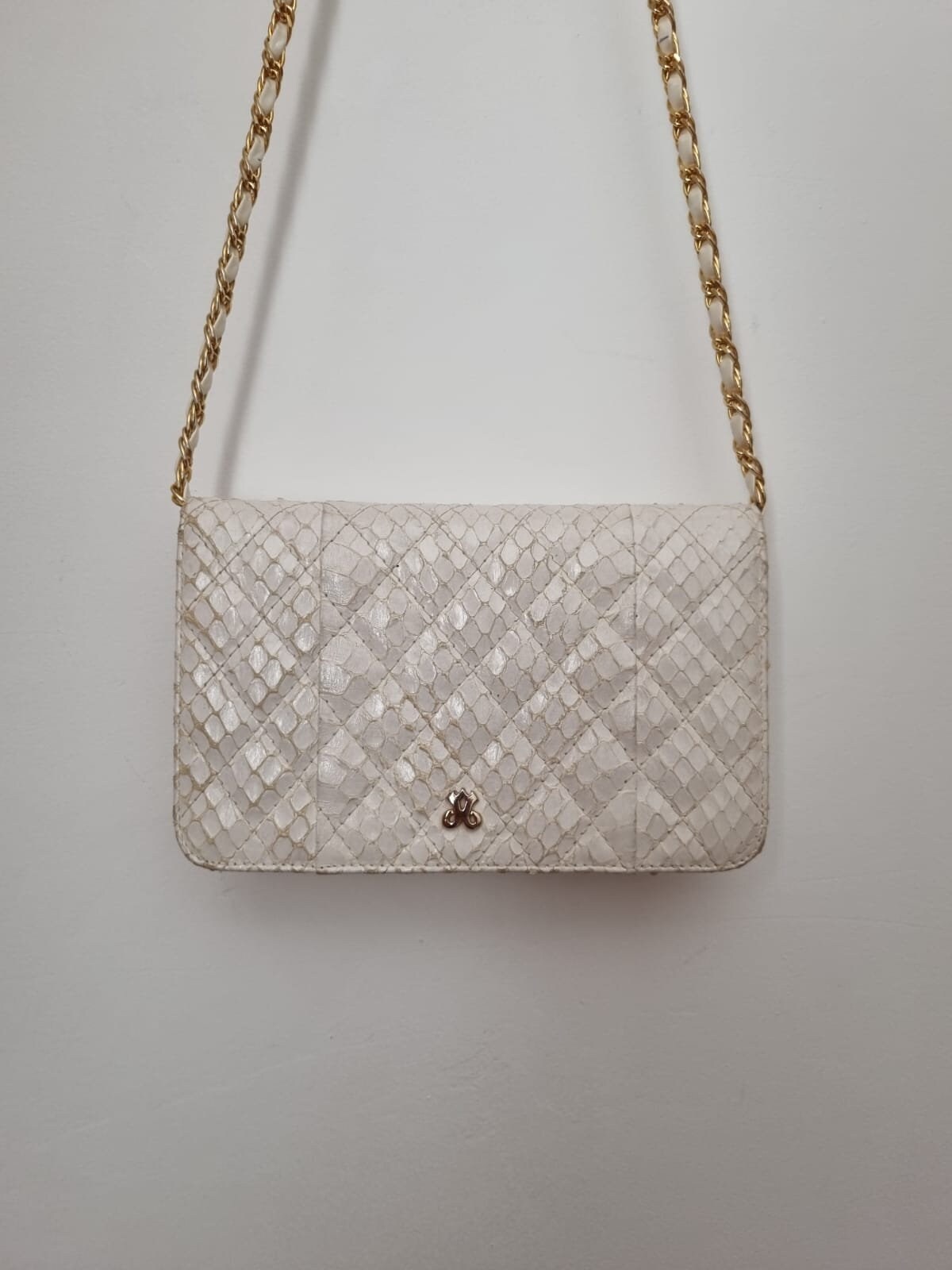 White snakeskin clutch clearance bag