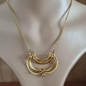 Vintage ketting goudkleurige statement ongemarkeerde gevouwen krulhanger
