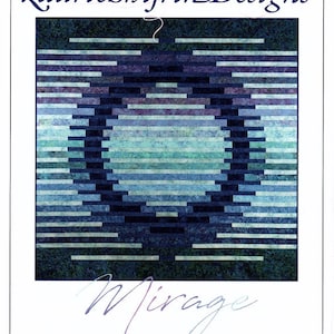 May include: A quilt pattern called "Mirage" by Laurie Shifrin Designs. The pattern features a symmetrical design with a circular shape in the center. The quilt is made up of horizontal strips of fabric in shades of blue, teal, and purple.