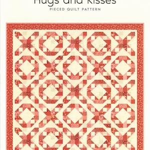 May include: A quilt pattern titled "Hugs and Kisses" by Laundry Basket Quilts. The design features a repeating pattern of red and pink X's and O's on a cream background. The quilt size is 68.5 inches by 68.5 inches.
