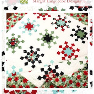 May include: A quilt pattern featuring a snowflake design in red, green, black, and white. The quilt is titled "Let It Snow" and is available from The Pattern Basket, Margot Languedoc Designs. www.thepatternbasket.com